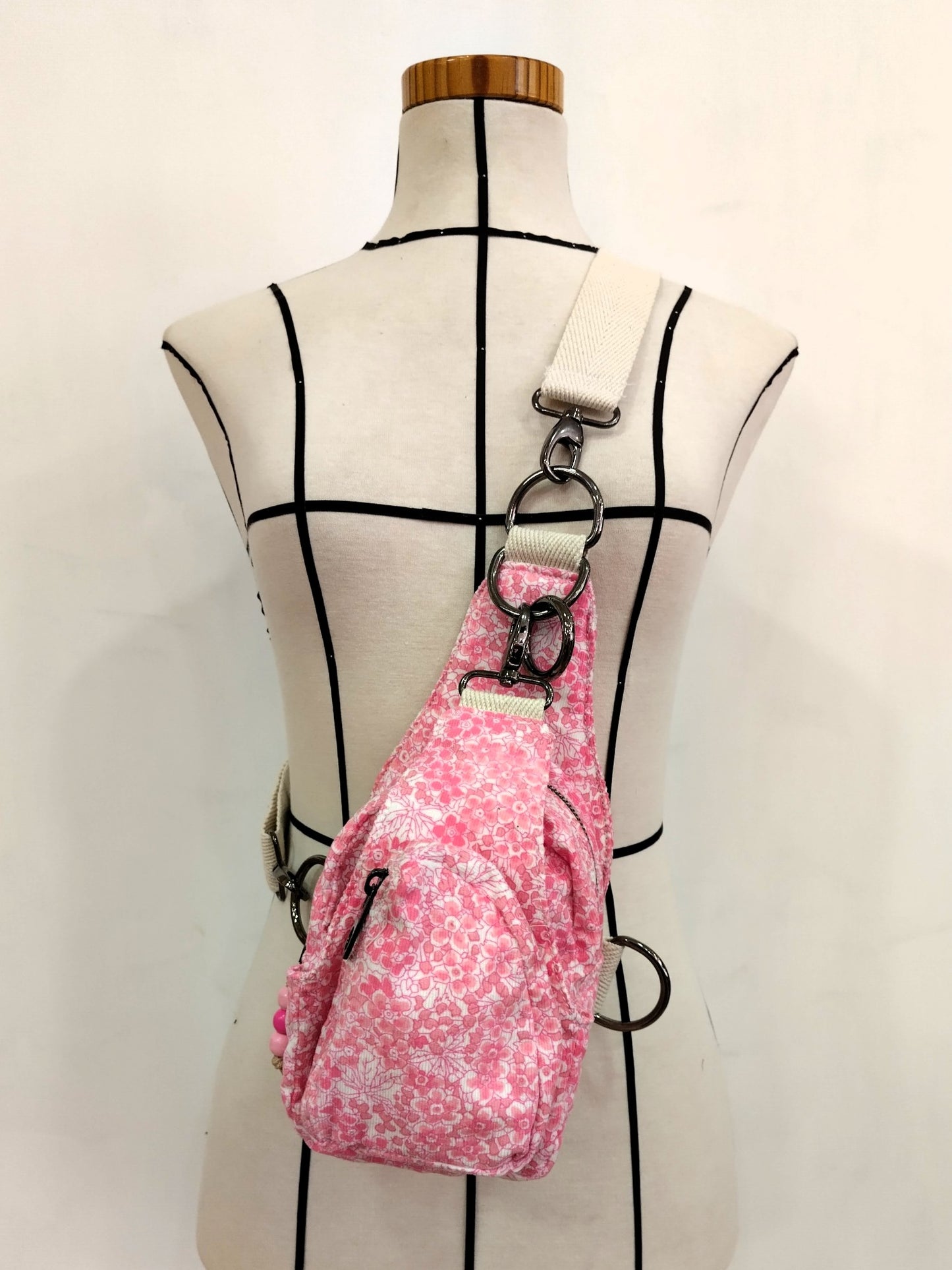 Mochila multiposición blanca y rosa