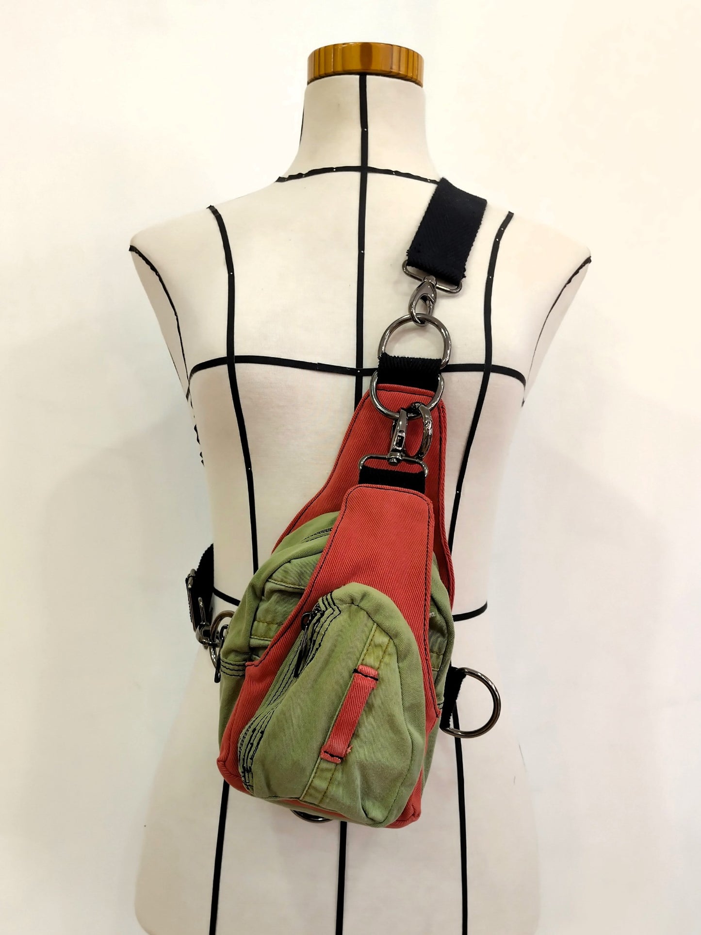 Mochila multiposición vaquera verde y naranja