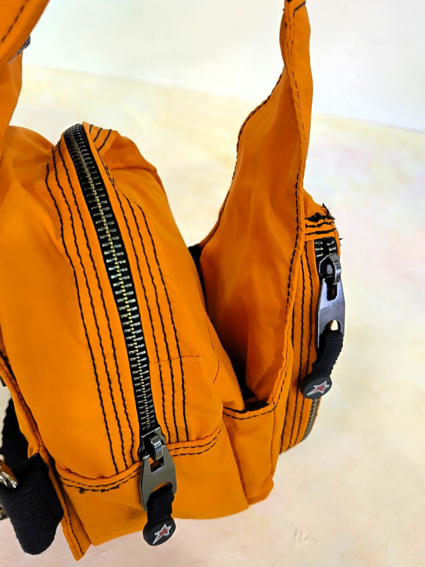 Mochila multiposición naranja