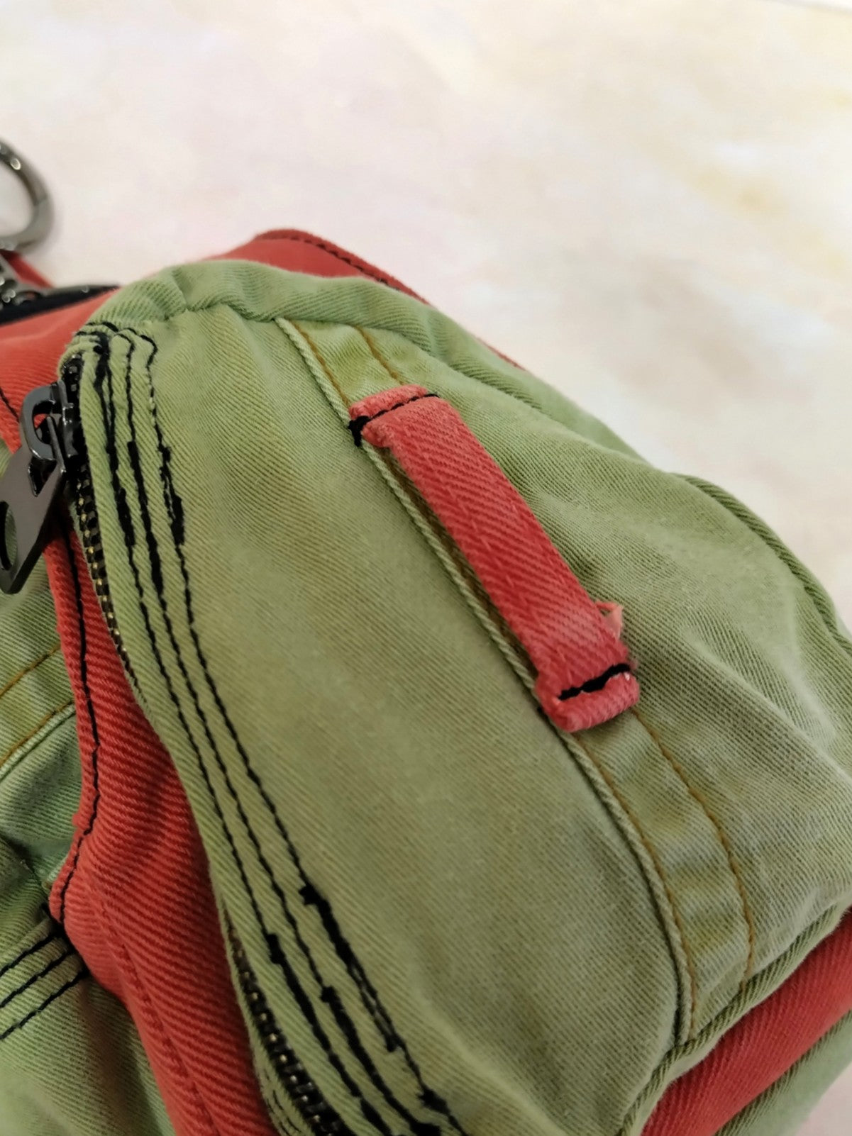 Mochila multiposición vaquera verde y naranja