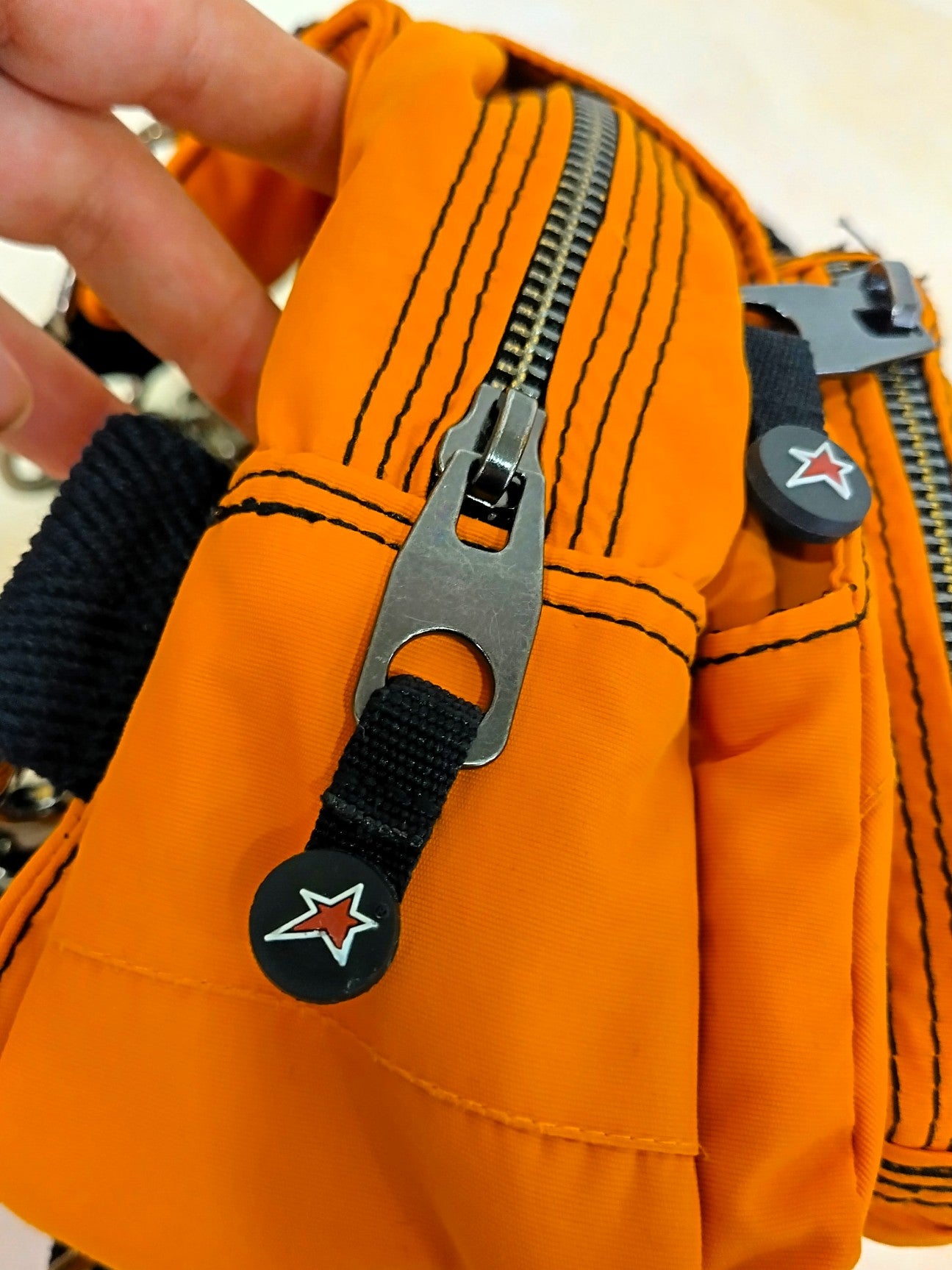 Mochila multiposición naranja